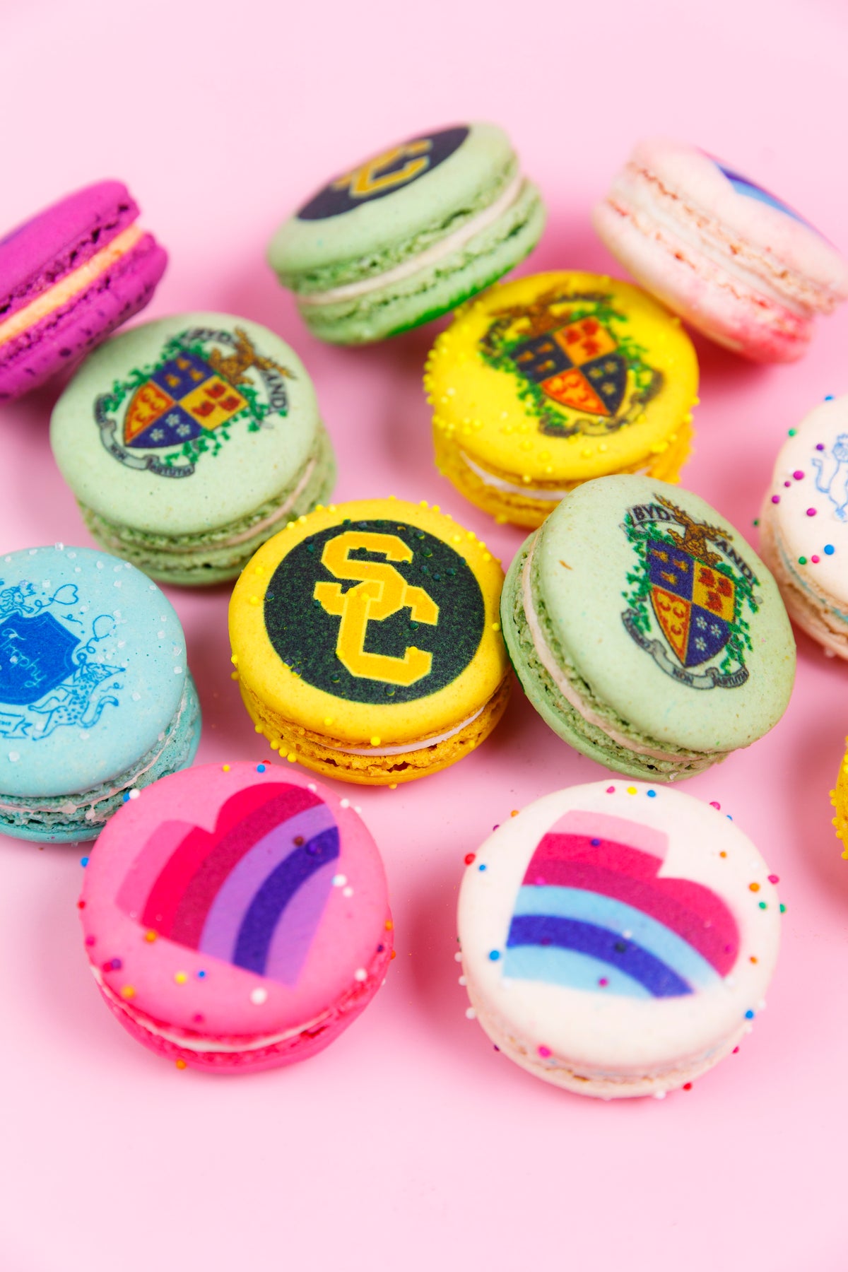 Macarons printed with school crests, team logos and rainbow hearts