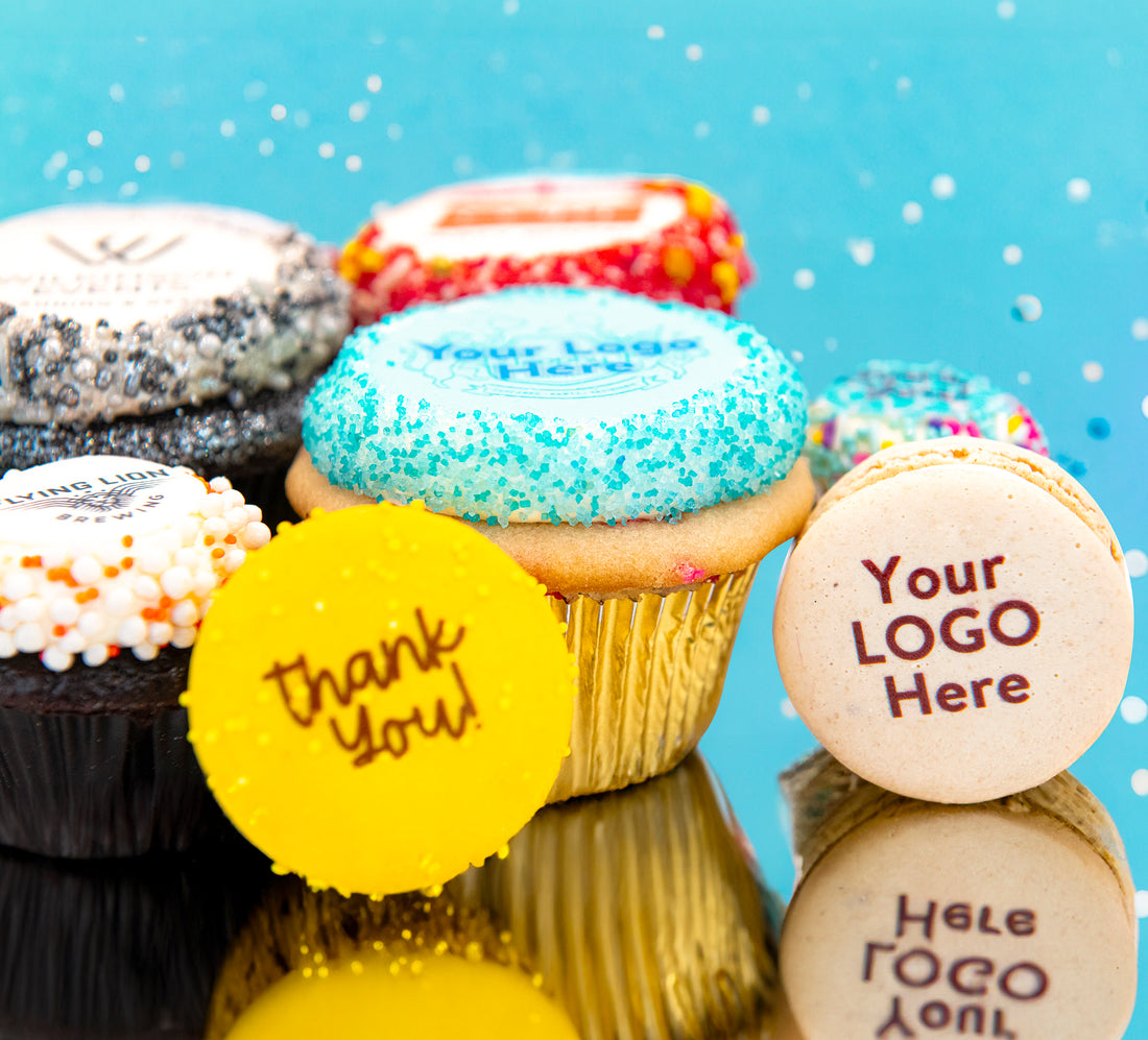 A group of Trophy cupcakes printed with a custom logo design
