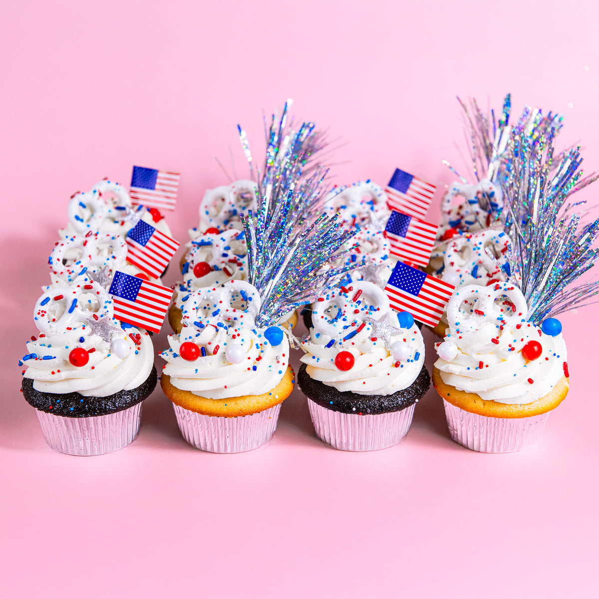 Trophy stars-and-stripes cupcakes with flags and sparklers