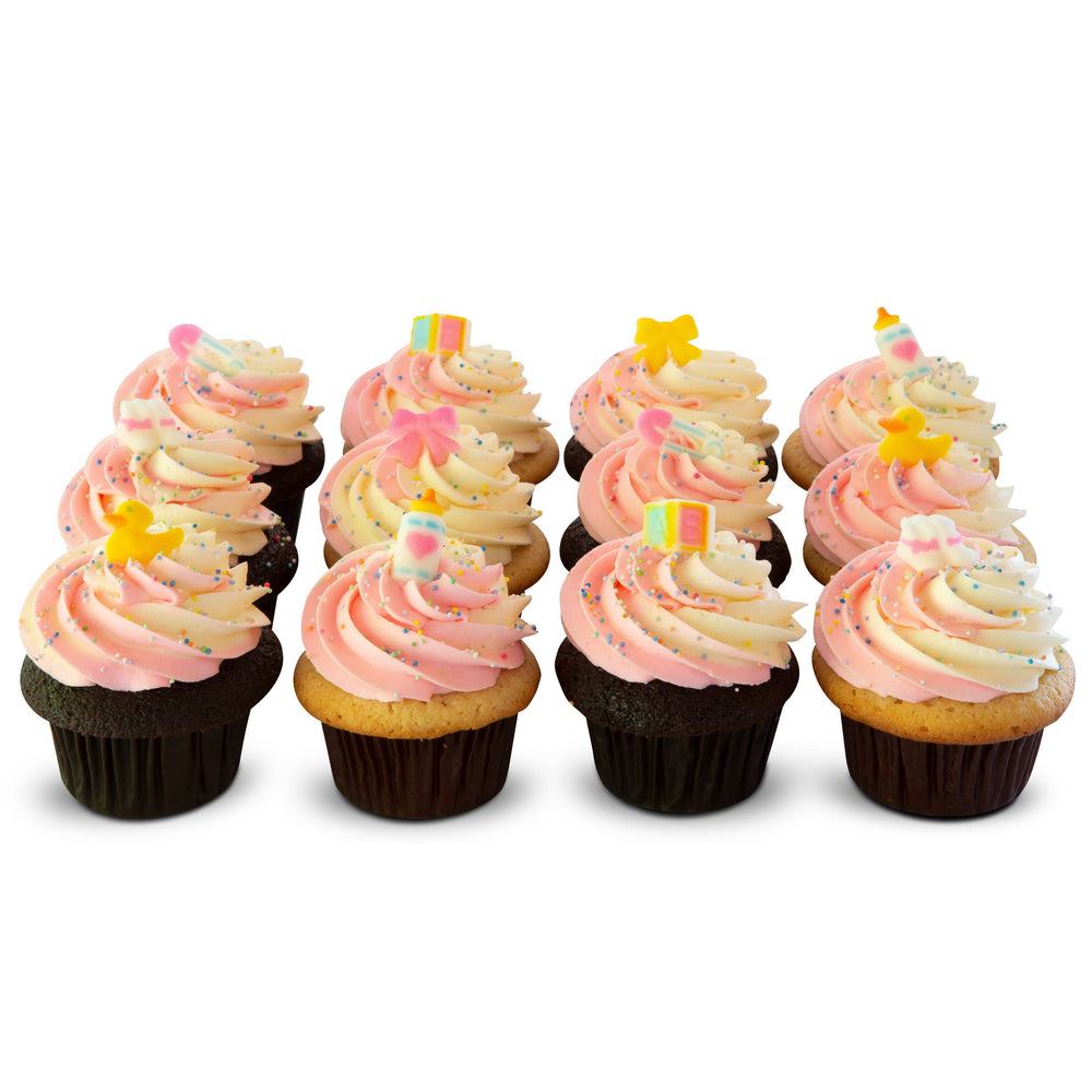 Baby Shower Girl dozen cupcakes with pink and white swirled buttercream and small baby-themed toppers